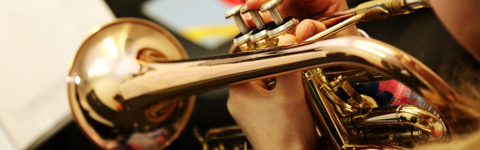 Junior RIAM Trumpet Student, Side View